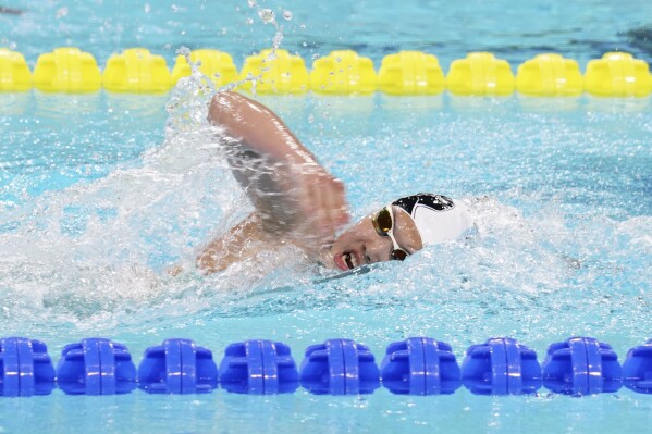 In this photo taken May 24, 2025, and released by Hebei Taihua Jinye Swimming Club, 12 years old Chinese swimmer Yu Zidi competes in the final of the the Women's 400m Individual Medley for the 2025 National Swimming Championships held in Shenzhen in southern China's Guangdong province. (Hebei Taihua Jinye Swimming Club via AP)