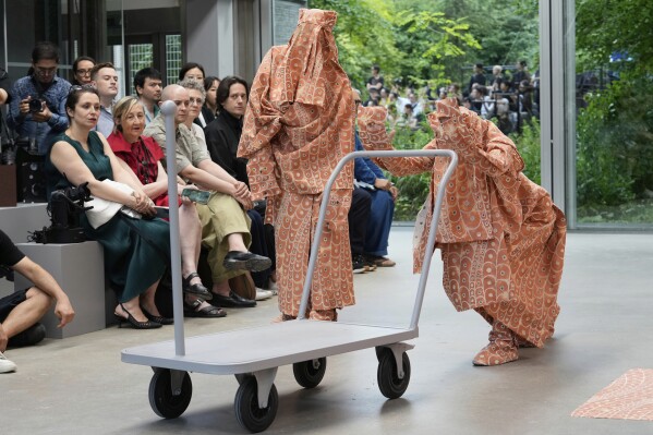 A model wears a creation part of the Issey Miyake men's Spring-Summer 2026 collection, that was presented in Paris Thursday, June 26, 2025. (AP Photo/Michel Euler)