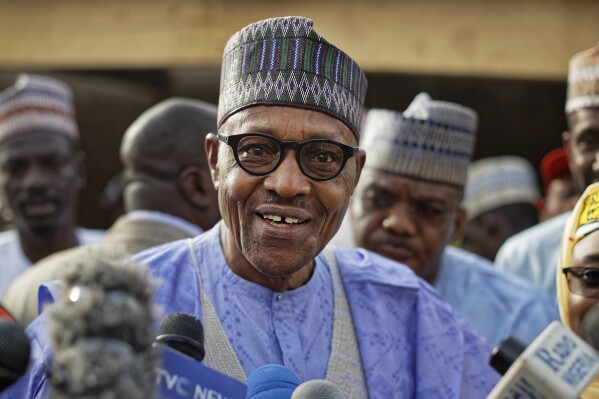 Nigeria's President Muhammadu Buhari speaks to the media after casting his vote in his hometown of Daura, in northern Nigeria, Saturday, Feb. 23, 2019. (AP Photo/Ben Curtis, File)