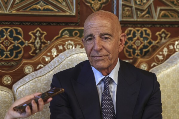 U.S. Ambassador to Turkey and Special Envoy to Syria Tom Barrack speaks during an interview with The Associated Press at the airport in Damascus, Syria, Wednesday, July 9, 2025. (AP Photo/Ghaith Alsayed)