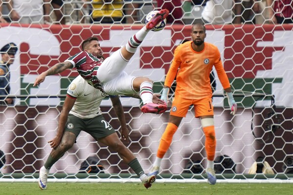 Fluminense's Everaldo attempts a shot on goal that went high against Chelsea during the second half of a Club World Cup semifinal soccer match in East Rutherford, N.J., Tuesday, July 8, 2025. (AP Photo/Frank Franklin II)