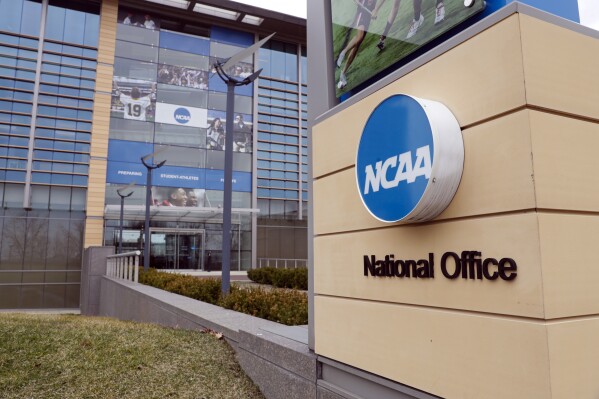 The national office of the NCAA in Indianapolis is shown on March 12, 2020. (AP Photo/Michael Conroy, File)