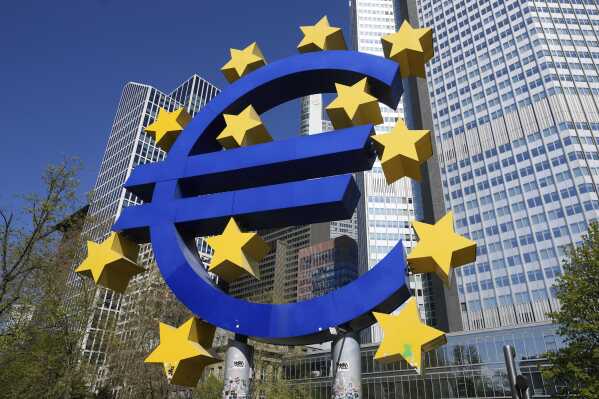 A view of the European currency Euro sculpture, at Germany's main financial district in Frankfurt, Germany, Wednesday, April 9, 2025. (AP Photo/Martin Meissner, File)