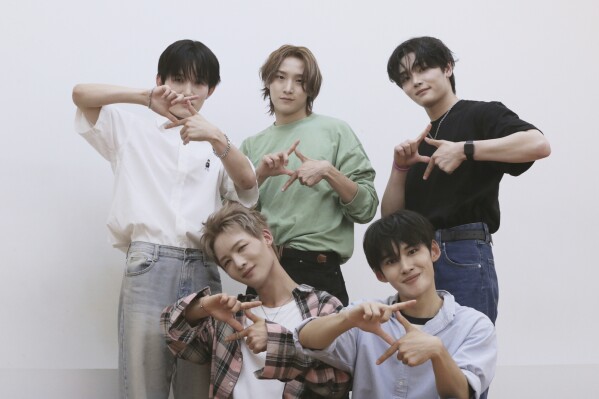 K-pop band 1VERSE members pose for photo at the dance practice room at their label in Seoul, South Korea, Wednesday, July 16, 2025. (AP Photo/Juwon Park)