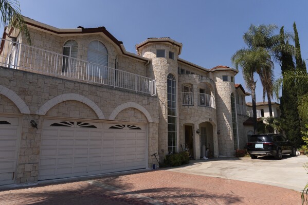The home of Silvia Zhang and Guojun Xuan is seen on Wednesday, July 16, 2025, in Arcadia, Calif., where a number of children were removed from the couple's home after a child abuse allegation in May, according to Arcadia police. (AP Photo/Jae C. Hong)