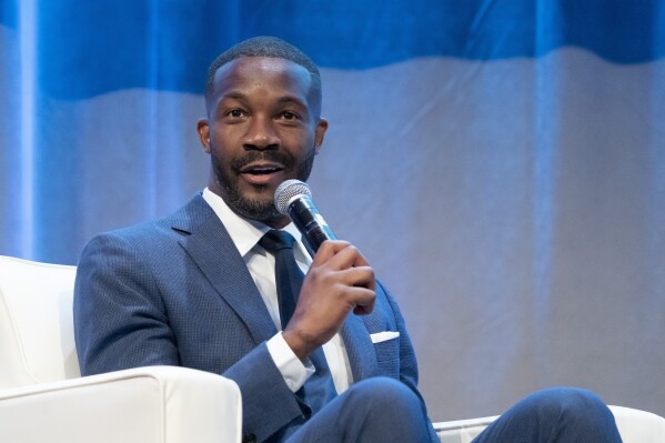 Birmingham, Ala., Mayor Randall Woodfin, moderates a conversation with Vice President Kamala Harris at the National Urban League Annual Conference, July 22, 2022, in Washington. (AP Photo/Alex Brandon, File)