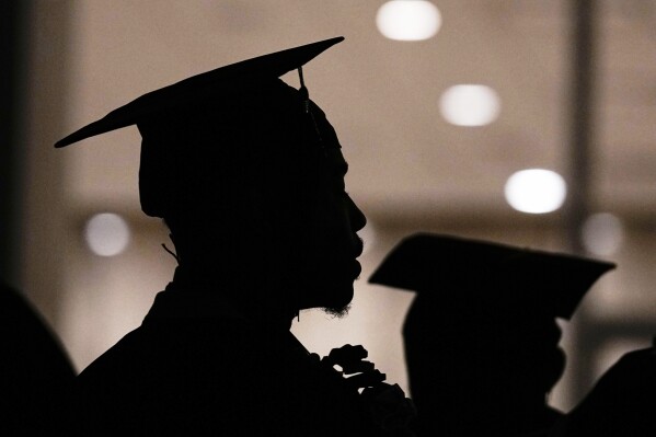 Morehouse College students line up before the school's commencement ceremonies in Atlanta on May 19, 2024. (AP Photo/Brynn Anderson, File)