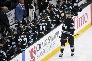 Utah Hockey Club center Jack McBain (22) celebrates a goal during the first period of an NHL hockey game against the Anaheim Ducks, Wednesday, March 12, 2025, in Salt Lake City. (AP Photo/Alex Goodlett, File)