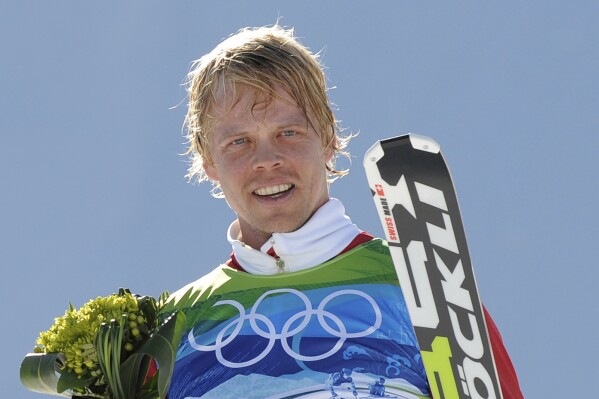 Audun Groenvold of Norway celebrates after taking third place in the men's skicross competition at the Vancouver 2010 Olympics in Vancouver, British Columbia, Sunday, Feb. 21, 2010. (AP Photo/Mark J. Terrill, File)