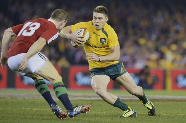 British and Irish Lions' Brian O'Driscoll, left, tackles Australia's James O'Connor during their rugby union test match in Melbourne, Australia, Saturday, June 29, 2013. (AP Photo/Mal Fairclough,File)