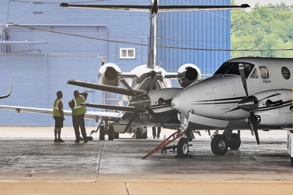 Jets are pictured at the Youngstown - Warren Regional Airport in Vienna, Ohio, Monday, June 30, 2025, where a day earlier a plane crashed on take off killing all onboard. (AP Photo/Sue Ogrocki)