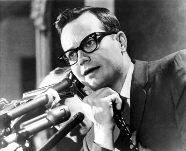 White House press secretary Bill Moyers appears at a press briefing at White House in Washington on Feb. 25, 1966. (AP Photo/William J. Smith, File)