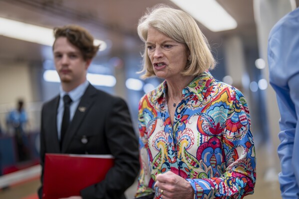 Sen. Lisa Murkowski, R-Alaska, a member of the Senate Appropriations Committee, heads to the chamber as Senate Republicans push President Donald Trump's request to cancel about $9 billion in foreign aid and public broadcasting spending, at the Capitol in Washington, Wednesday, July 16, 2025. (AP Photo/J. Scott Applewhite)