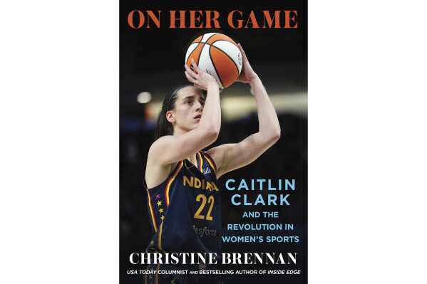 This cover image released by Scribner shows "On Her Game: Caitlin Clark and the Revolution in Women's Sports" by Christine Brennan. (Scribner via AP)