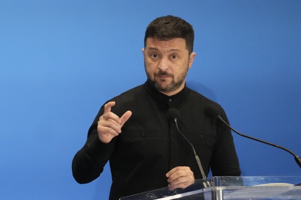 Ukraine's President Volodymyr Zelenskyy speaks with reporters during the Ukraine Recovery Conference at La Nuvola convention center in Rome, Thursday, July 10, 2025. (AP Photo/Gregorio Borgia)