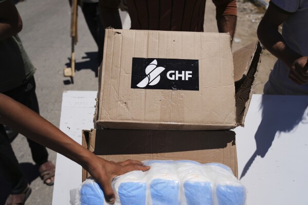 Boxes and bags of humanitarian aid delivered by the Gaza Humanitarian Foundation, a U.S.-backed organization approved by Israel, are seen in Khan Younis, southern Gaza Strip, on May 29, 2025. (AP Photo/Abdel Kareem Hana, File)