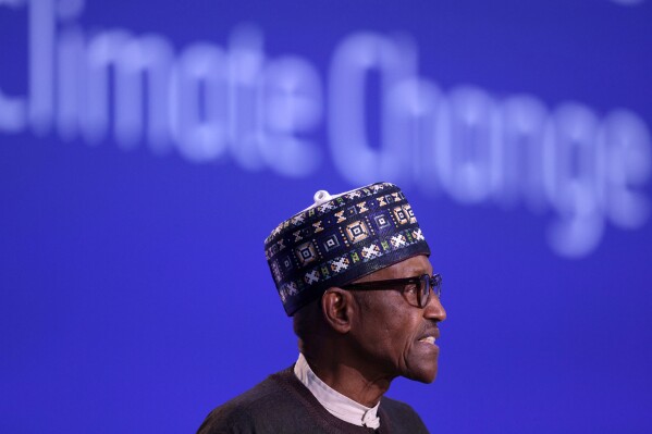 Nigeria's President Muhammadu Buhari speaks during the UN Climate Change Conference COP26 in Glasgow, Scotland, Tuesday, Nov. 2, 2021. (Adrian Dennis/Pool Photo via AP, File)