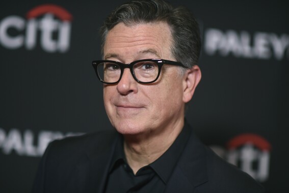 Stephen Colbert arrives at a screening of "The Late Show with Stephen Colbert," during PaleyFest, April 21, 2024, at the Dolby Theatre in Los Angeles. (Photo by Richard Shotwell/Invision/AP, File)
