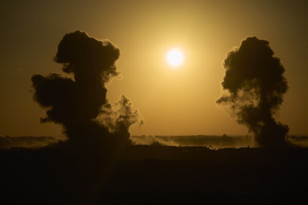 Smoke rises following an explosion near destroyed buildings inside the Gaza Strip, as seen from southern Israel, on Sunday, July 6, 2025. (Photo/Ohad Zwigenberg)