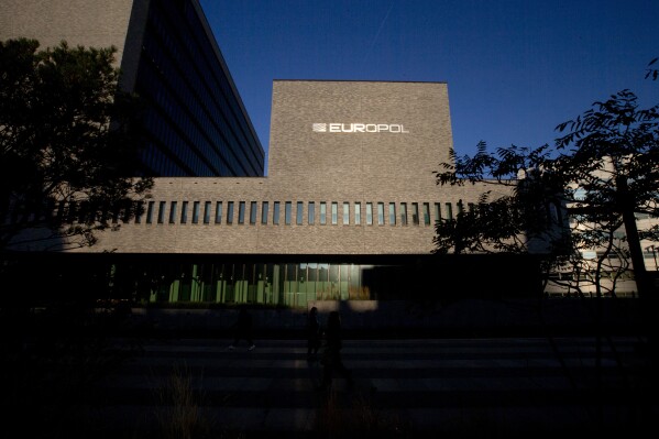 FILE- The Europol headquarters in The Hague, Netherlands, Wednesday, Oct. 10, 2018. (AP Photo/Peter Dejong, File)