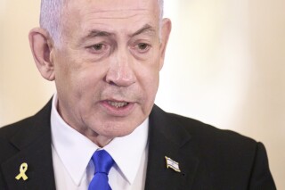 Israeli Prime Minister Benjamin Netanyahu speaks to the media, Tuesday, July 8, 2025, on Capitol Hill in Washington. (AP Photo/Jacquelyn Martin)