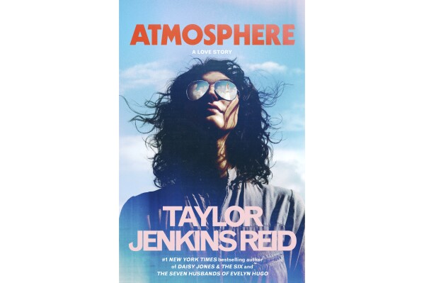 This cover image released by Ballantine shows "Atmosphere" by Taylor Jenkins Reid. (Ballantine via AP)