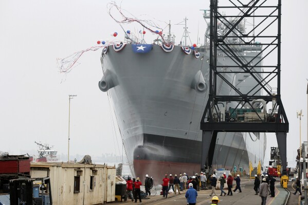 The U.S. Navy launches the USNS Harvey Milk, a fleet replenishment oiler ship named after the first openly gay elected official, in San Diego, Saturday, Nov. 6, 2021. (AP Photo/Alex Gallardo, File)