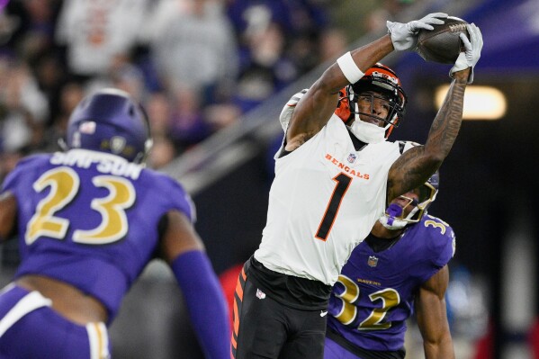 Cincinnati Bengals wide receiver Ja'Marr Chase (1) reaches for a pass during the first half of an NFL football game against the Baltimore Ravens, Thursday, Nov. 7, 2024, in Baltimore. (AP Photo/Nick Wass, File)