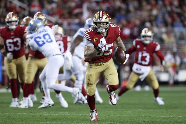 San Francisco 49ers tight end George Kittle (85) runs after a catch during the first half of an NFL football game against the Detroit Lions, Monday, Dec. 30, 2024, in Santa Clara, Calif. (AP Photo/Jed Jacobsohn)