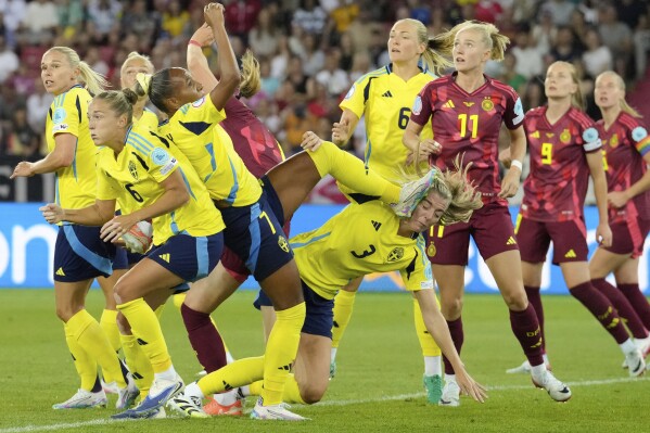 Sweden's Madelen Janogy cites her teammate Linda Sembrant with the boot on the face during the Women's Euro 2025, group C, soccer match between Sweden and Germany at Stadion Letzigrund in Zurich, Switzerland, Saturday, July 12, 2025. (AP Photo/Martin Meissner)