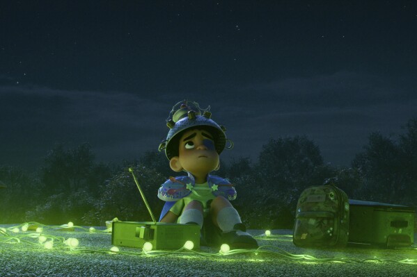 This image released by Disney/Pixar shows Elio, voiced by Yonas Kibreab in a scene from "Elio." (Disney/Pixar via AP)