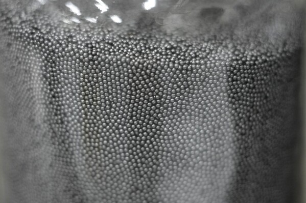 Uranium kernels wrapped in three alternating layers of pyrolytic carbon and silicon carbide used for the manufacture of TRISO fuel are visible on Friday, June 27, 2025, in Oak Ridge, Tenn. (AP Photo/George Walker IV)