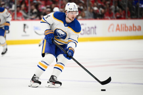 Buffalo Sabres defenseman Bowen Byram (4) plays in the first period of an NHL hockey game against the Washington Capitals, March 30, 2025, in Washington. (AP Photo/Nick Wass, File)