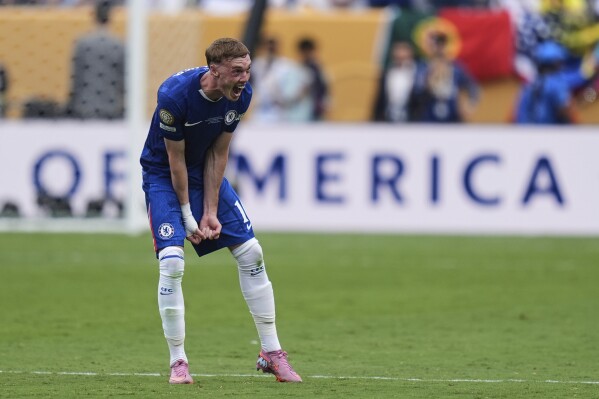 Chelsea's Cole Palmer (10) celebrates winning the Club World Cup final soccer match between Chelsea and PSG in East Rutherford, N.J., Sunday, July 13, 2025. (AP Photo/Seth Wenig)