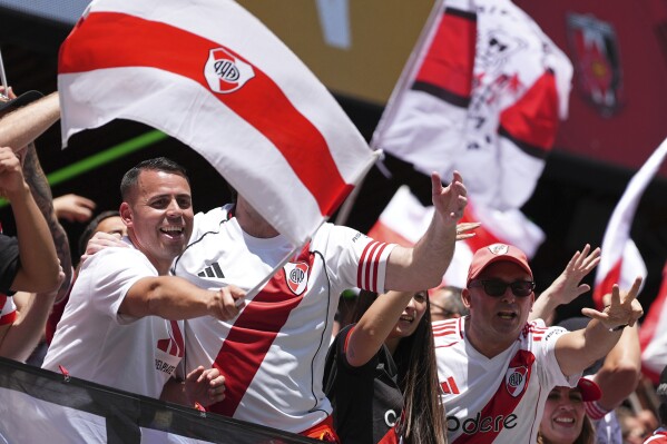 River Plate fans celebrate after the Club World Cup group E soccer match between River Plate and Urawa Red Diamonds in Seattle, Tuesday, June 17, 2025. (AP Photo/Lindsey Wasson)