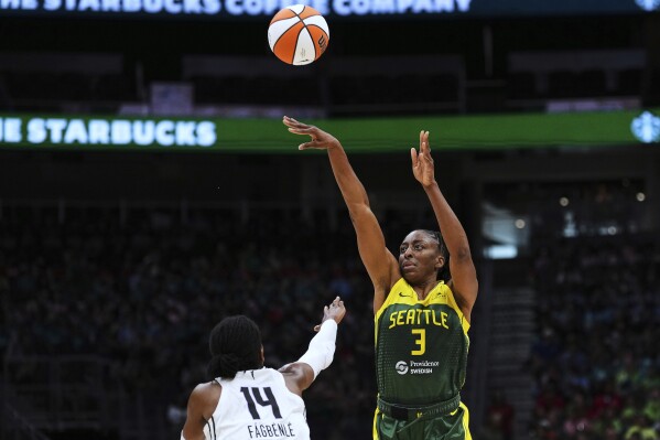 Seattle Storm forward Nneka Ogwumike (3) shoots against Golden State Valkyries center Temi Fagbenle (14) during the first half of a WNBA basketball game Wednesday, July 16, 2025, in Seattle. (AP Photo/Lindsey Wasson)
