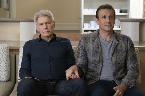 This image released by Apple TV+ shows Harrison Ford, left, and Jason Segel in a scene from "Shrinking." (Beth Dubber/Apple TV+ via AP)