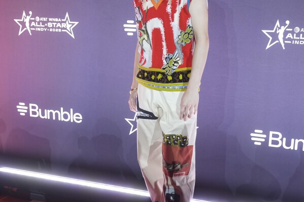 Dallas Wings' Paige Bueckers poses on the orange carpet for WNBA All Star basketball events, Thursday, July 17, 2025, in Indianapolis. (AP Photo/Darron Cummings)