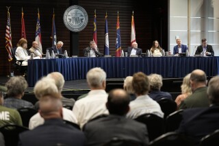 Members of the Tennessee Valley Authority Board of Directors listen to members of the public during a meeting May 8, 2024, in Nashville, Tenn. (AP Photo/George Walker IV, File)