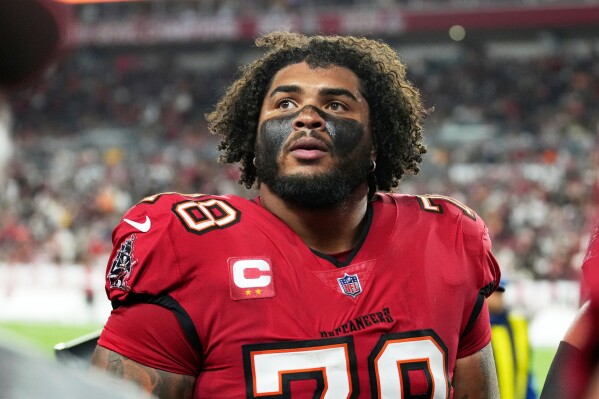 Tampa Bay Buccaneers offensive tackle Tristan Wirfs leaves the field at half time during an NFL football Wild Card playoff game against the Washington Commanders, Jan 12, 2025, in Tampa, Fla. (AP Photo/Peter Joneleit), File