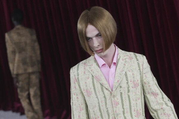 A model wears a creation part of the men's Junya Watanabe Spring-Summer 2026 collection, that was presented in Paris Friday, June 27, 2025. (AP Photo/Christophe Ena)