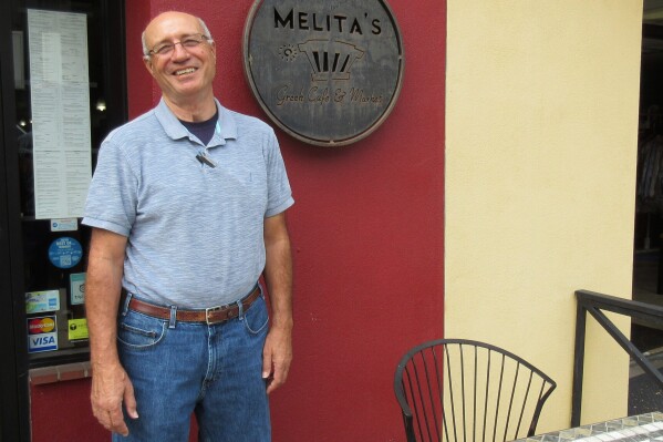 Dennis Georgatos, a longtime sports writer for The Associated Press and the San Jose Mercury News and author of several books on the San Francisco 49ers, is photographed on Sept. 30, 2015 in Denver. (Tina Susman via AP)