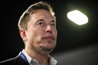 Tesla and SpaceX's CEO Elon Musk attends the first plenary session on of the AI Safety Summit at Bletchley Park, on Wednesday, Nov. 1, 2023 in Bletchley, England. (Leon Neal/Pool Photo via AP, File)