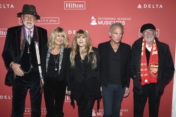 Honorees Mick Fleetwood, from left, Christine McVie, Stevie Nicks, Lindsey Buckingham and John McVie of Fleetwood Mac arrive at the 2018 MusiCares Person of the Year tribute in New York on Jan. 26, 2018. (Photo by Charles Sykes/Invision/AP, File)