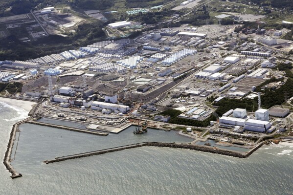 This aerial view shows the Fukushima Daiichi nuclear power plant in Fukushima, northern Japan, on Aug. 24, 2023, shortly after its operator Tokyo Electric Power Company Holdings TEPCO began releasing its first batch of treated radioactive water into the Pacific Ocean. (Kyodo News via AP, File)