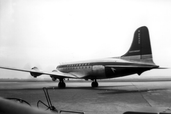 This undated photo from the 1940s provided by author and researcher Valerie van Heest shows a Northwest Orient plane in Milwaukee before it crashed in Lake Michigan in 1950. (Leo Kohn/Courtesy of Valerie van Heest via AP)