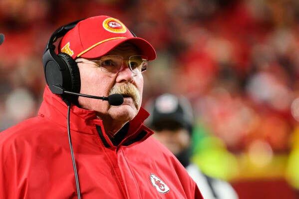 Kansas City Chiefs head coach Andy Reid looks at the scoreboard during a break in action against the Houston Texans during the second half of an NFL football divisional playoff game, Saturday, Jan. 18, 2025 in Kansas City, Mo. (AP Photo/Reed Hoffmann, File)