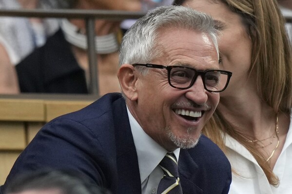 Gary Lineker, sports broadcaster and former England soccer player smiles as he takes his seat in the Royal Box on Centre Court on day six of the Wimbledon tennis championships in London, Saturday, July 8, 2023. (AP Photo/Alastair Grant, File)