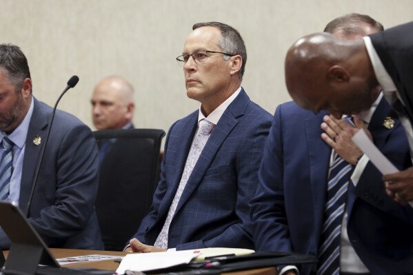 Former Michigan State Police trooper Brian Keely appears in court for his preliminary hearing at the Kentwood District Court, in Kentwood, Mich., August 12, 2024. (Neil Blake/The Grand Rapids Press via AP)