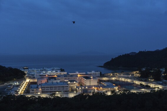 FILE -The exterior view of Shek Pik Prison in Hong Kong, April 29, 2025. (AP Photo/Chan Long Hei, File)